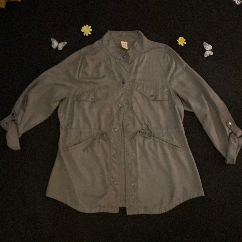 Must have light camouflage green snap down shirt with drawstrings and pockets!